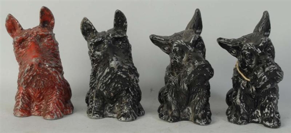 LOT OF 4: CAST IRON SCOTTIE DOG STILL BANKS.      