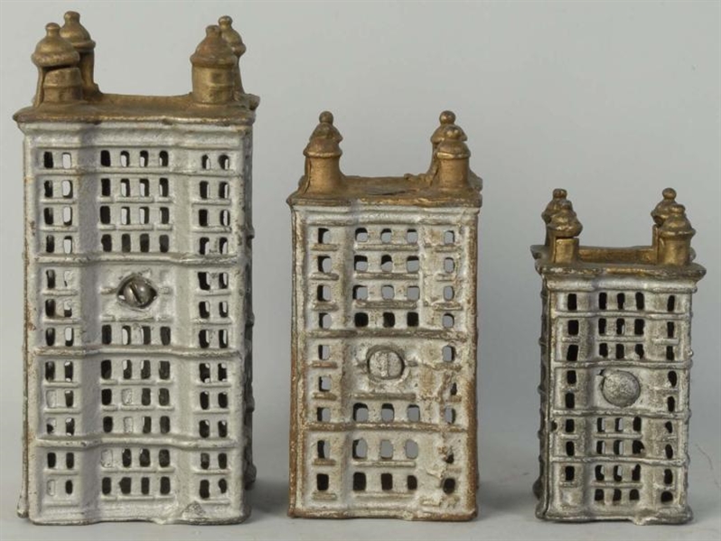 LOT OF 3: CAST IRON BUILDING STILL BANKS.         