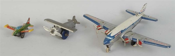 LOT OF 3: TIN FRICTION AIRPLANE TOYS.             