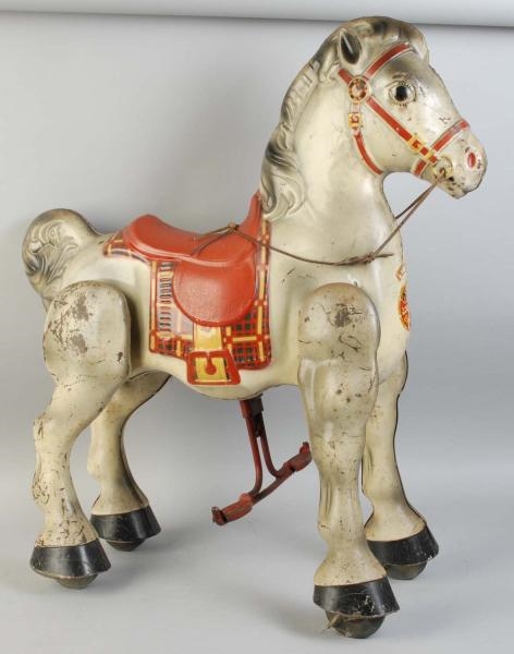 CHILDRENS RIDING HORSE TOY.                      