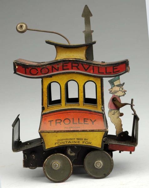 TIN LITHO NIFTY TOONERVILLE TROLLEY TOY.          