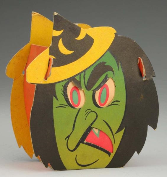 EARLY CARDBOARD WITCH HALLOWEEN DECORATION.       