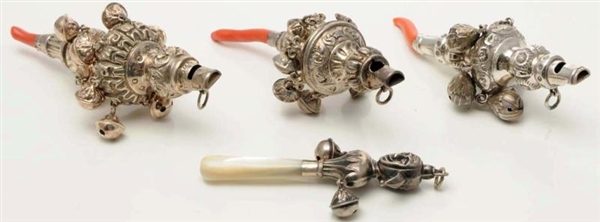 A GROUP OF THREE ENGLISH SILVER AND CORAL RATTLES 