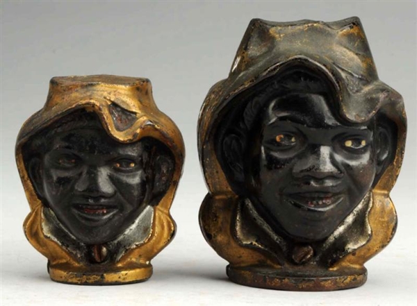 LOT OF 2: CAST IRON 2-FACED JOLLY BANKS.          