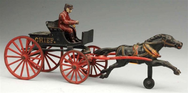 CAST IRON HORSE-DRAWN FIRE CHIEF WAGON TOY.       