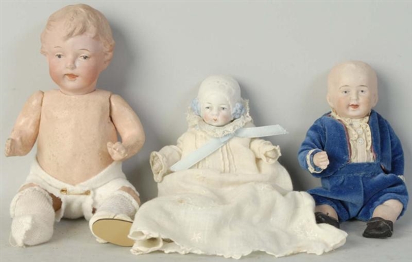 LOT OF 3: ANTIQUE DOLLS.                          