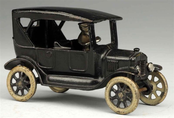 CAST IRON ARCADE MODEL T COUPE TOY.               