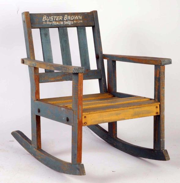 BUSTER BROWN WOODEN ROCKING CHAIR.                