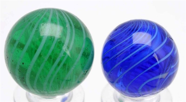 LOT OF 2: COLORED GLASS SWIRL MARBLES.            