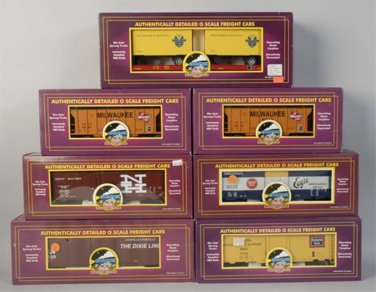 LOT OF 7: MTH FREIGHT TRAIN CARS.                 