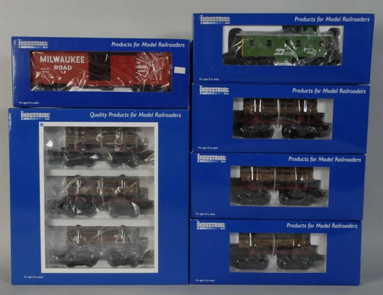 LOT OF 6: INDUSTRIAL RAIL FREIGHT TRAIN CARS.     