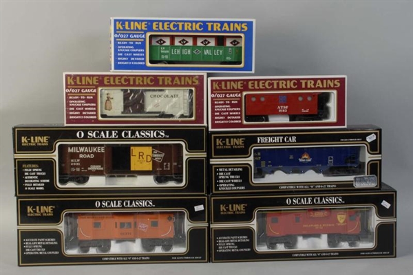 LOT OF 7: K-LINE FREIGHT TRAIN CARS.              