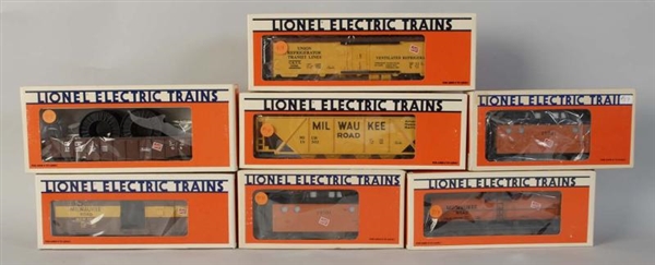 LOT OF 7: LIONEL MILWAUKEE ROAD FREIGHT CARS.     