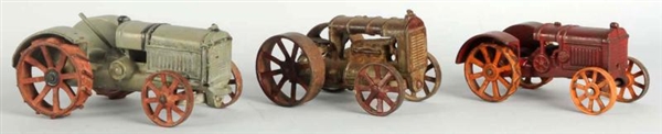 LOT OF 3: CAST IRON TRACTOR TOYS.                 