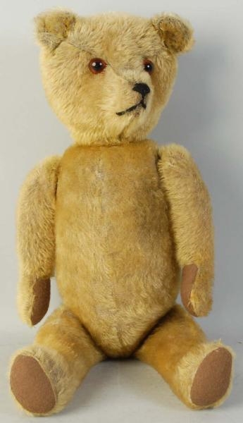 AMERICAN STRAW-STUFFED TEDDY BEAR.                