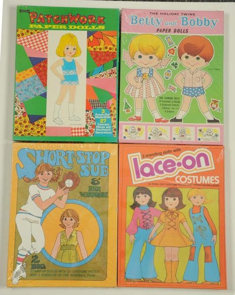 LOT OF 4: MODERN BOXED PAPER DOLLS.               