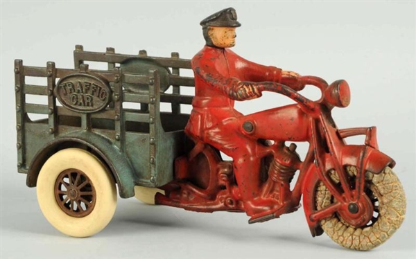 CAST IRON HUBLEY TRAFFIC CAR MOTORCYCLE TOY.      