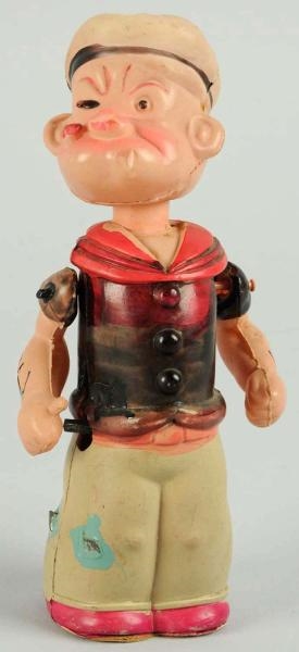 CELLULOID WIND-UP POPEYE TOY.                     