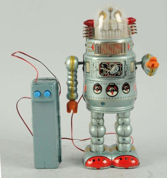 TIN LITHO BATTERY-OPERATED DOOR ROBOT.            