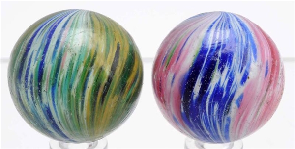 LOT OF 2: 4-PANELED ONIONSKIN MARBLES.            