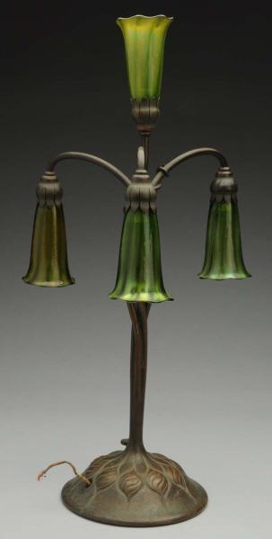 TIFFANY BRONZE LAMP WITH FAVRILE GLASS SHADES.    