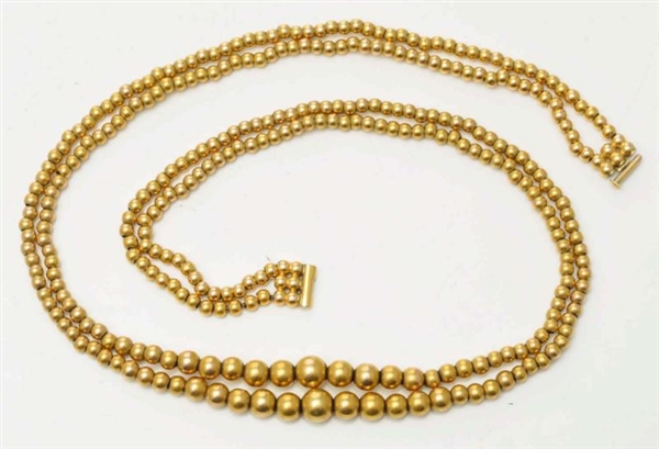 LADIES 14K Y. GOLD DOUBLE STRANDED NECKLACE.      