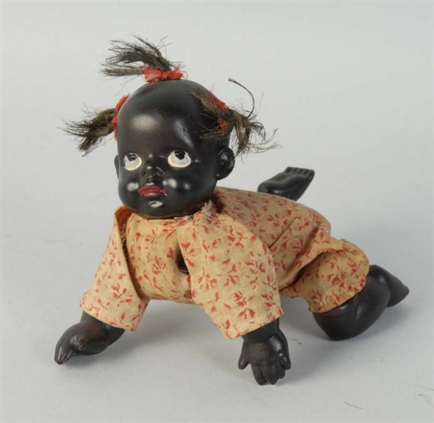 CELLULOID CRAWLING BABY  WIND-UP TOY.             