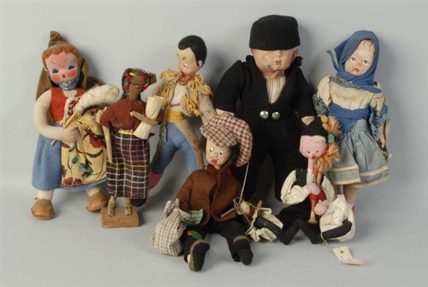 LOT OF 7: FOREIGN MADE CHARACTER DOLLS.           