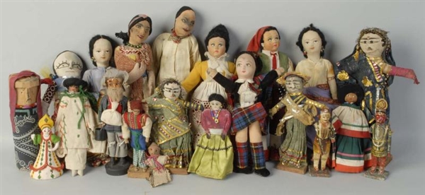 LOT F 21: CLOTH AND WOODEN CHARACTER DOLLS.       