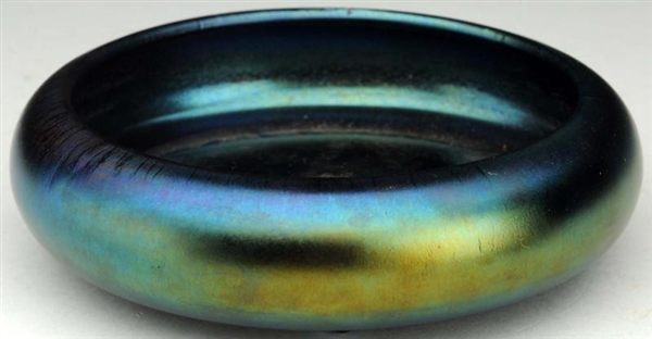 ART GLASS 3-FOOTED BLUE BOWL.                     