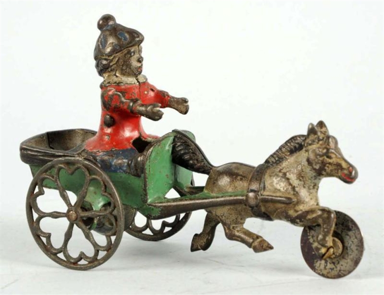 CAST IRON HORSE-DRAWN BELL TOY.                   