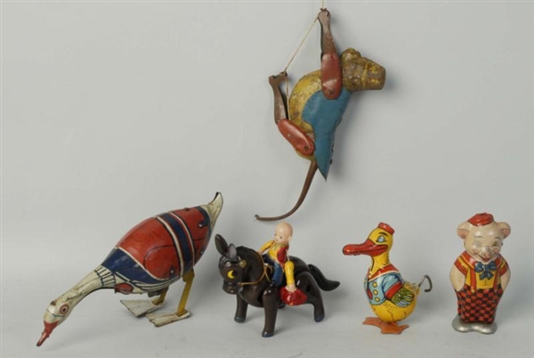LOT OF 6: TIN LITHO AND CELLULOID ANIMAL TOYS.    