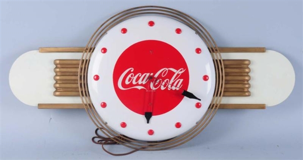 1950S COCA-COLA CLOCK AND WINGS.                  