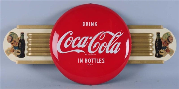 1954 COCA-COLA BUTTON ON WINGS DISPLAY.           