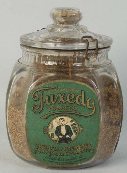 TUXEDO ONE POUND GLASS CANISTER.                  