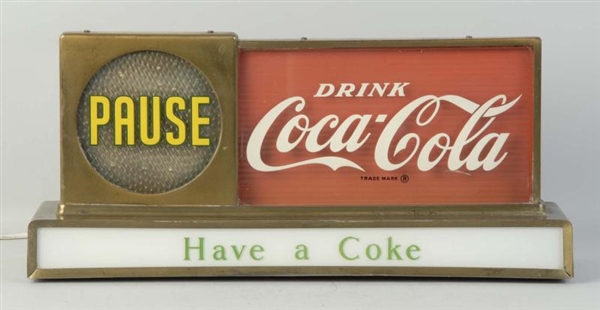 1950S COCA-COLA PAUSE MOTION LIGHTED SIGN.        