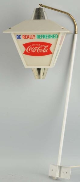 1960S COCA-COLA SMALL LANTERN REVOLGING SIGN.     