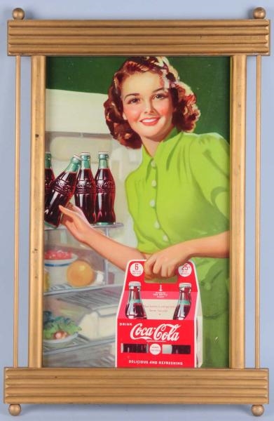 SMALL COCA-COLA POSTER WITH A NEWER FRAME.        
