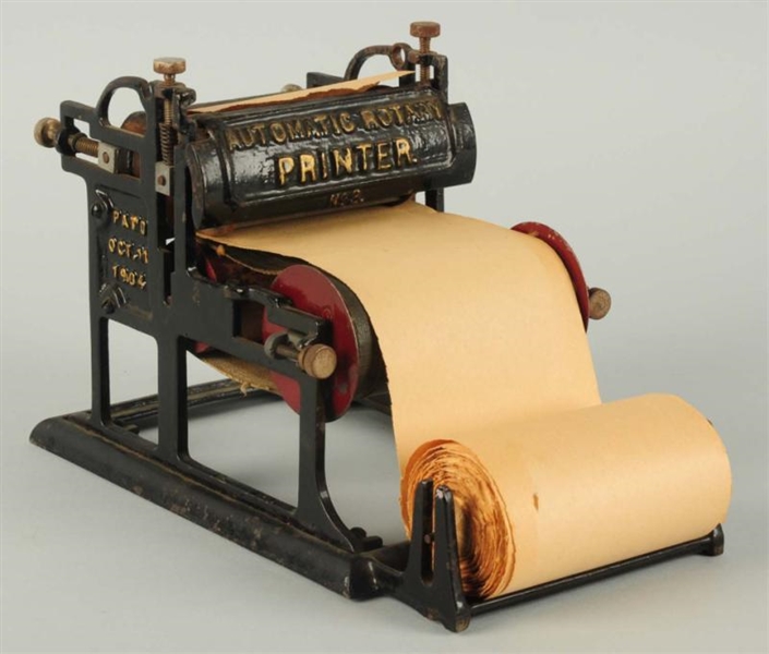 EARLY CAST IRON AUTOMATIC PAPER PRINTER.          