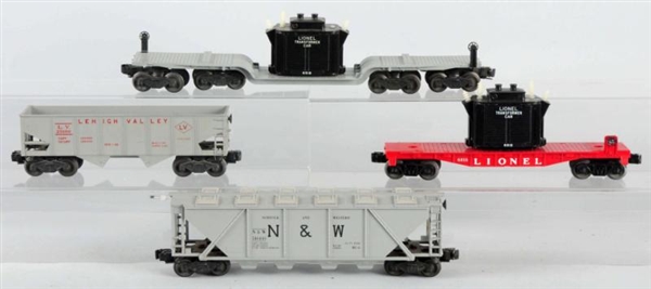 LOT OF 4: LIONEL TRAIN CARS WITH BOXES.           