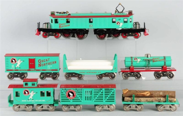 LOT OF 7: PIECE MCCOY TRAIN SET WITH BOXES.       