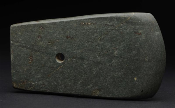  EARLY FORM GREENSTONE DRILLED SPATULATE.         
