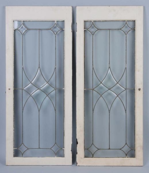 LOT OF 2: ANTIQUE STAINED GLASS WINDOWS.          