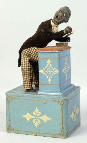 EARLY AMERICAN IVES CLOCKWORK PREACHER TOY.       