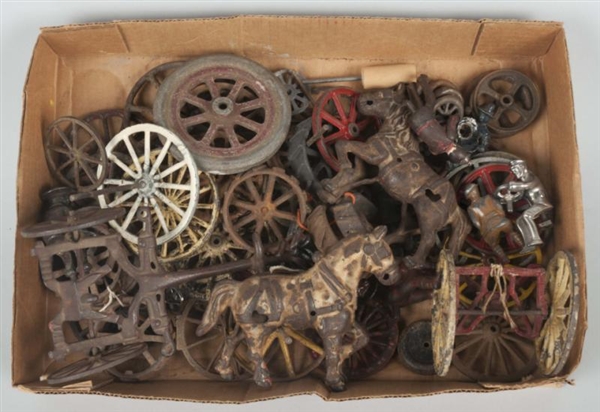 LOT OF CAST IRON TOY PARTS.                       