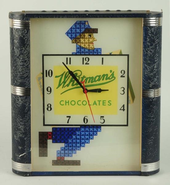 ELUSIVE WHITMANS ELECTRIC LIGHTED CLOCK.          