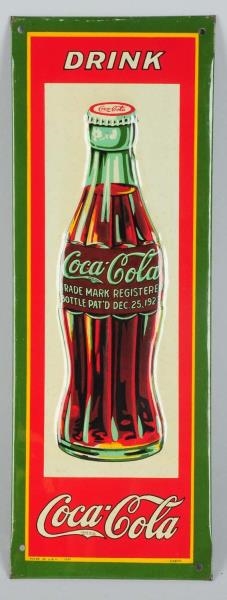 1931 COCA-COLA EMBOSSED TIN BOTTLE SIGN.          