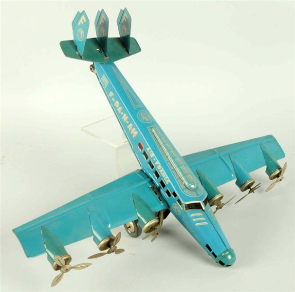 FRENCH TIN LITHO WIND-UP AIRPLANE TOY.            