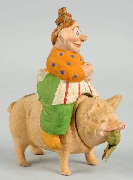 MAMA KATZENJAMMER RIDING PIG CANDY CONTAINER.     
