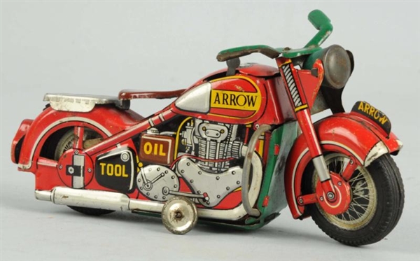 JAPANESE TIN ARROW WIND-UP MOTORCYCLE TOY.        